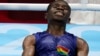 Dan wasan damben zamani na kasar Ghana Tetteh Sulemanu yana murnar doke abokin karawarsa Rodrigo Marte de la Rosa na aksar Jamhuriyar Dominica a gasar Olympics