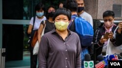 Journalist Bao Choy is pictured outside Fanling Magistrates Court after her hearing, Nov. 10, 2020. (Tommy Walker/VOA)