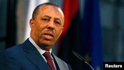 FILE - Libyan Prime Minister Abdullah al-Thinni takes part in a news conference in Valletta, Malta, Oct. 21, 2014.