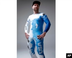 In this undated photo provided by Kappa, U.S. ski racer Travis Ganong dons the new race suit to be worn at the world ski championships in France.