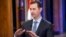 El presidente sirio Bashar al-Assad habla durante una entrevista con Fox News channel en Damasco.
(Foto divulgada por SANA).