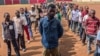 Volunteers line up at Funu Stadium in the city of Bukavu to register to fight alongside the Armed Forces of the Democratic Republic of the Congo against M23 rebels, Jan. 31, 2025. 