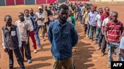 Volunteers line up at Funu Stadium in the city of Bukavu to register to fight alongside the Armed Forces of the Democratic Republic of the Congo against M23 rebels, Jan. 31, 2025. 