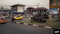 FILE - Soldiers of the 21st Motorized Infantry Brigade patrol in the streets of Buea, South-West Region of Cameroon on April 26, 2018. 