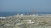 Pakistan's newly-built cargo port of Gwadar under construction is jointly developed by Chinese and Pakistani engineers.