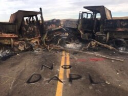'No DAPL', or Dakota access pipeline, spray is painted across the site of the most recent protest flare up in North Dakota. (VOA/J. Patinkin)
