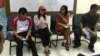 Monika (kedua kiri), Oky Wiratama (kedua kanan), dan Bobi Maarif (kanan) dalam konferensi pers di LBH Jakarta, Minggu (23/6/2019) siang. (VOA/Rio Tuasikal)