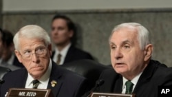 Senator Jack Reed, a Democrat, right, gives opening remarks as Senator Roger Wicker, a Republican, looks on during the Senate Armed Services Committee confirmation hearing for Pete Hegseth, at the Capitol in Washington, Jan. 14, 2025.