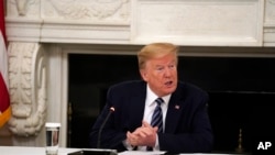 President Donald Trump speaks during a meeting with Republican lawmakers, in the State Dining Room of the White House, May 8, 2020, in Washington.