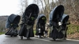 Revelers in eerie outfits take part in the traditional carnival of Zubieta, in the northern Spanish province of Navarre, Jan. 28, 2025. 