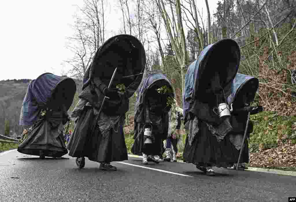 Revelers in eerie outfits take part in the traditional carnival of Zubieta, in the northern Spanish province of Navarre.