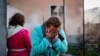 A woman cries after her home was destroyed in a Russian missile strike in Ukraine's Odesa region, Nov. 17, 2024. (Ukrainian Emergency Service via AP)