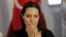 FILE - United Nations High Commissioner for Refugees (UNHCR) Special Envoy Angelina Jolie attends a news conference.