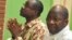 FILE - In this photo taken on April 27, 2017 at the High Court of Justice in Ouagadougou, Burkina Faso's former foreign minister Djibril Bassole (L) sits next to General Gilbert Diendere, as they wait for the opening of the trial of the former president a
