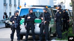 Police officers patrol after police fired shots at a suspicious person near the Israeli Consulate and a museum on the city's Nazi-era history in Munich, Germany, Sept. 5, 2024.