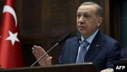 Presiden Turki Recep Tayyip Erdogan berbicara di depan parlemen Turki di Ankara, 25 Oktober 2023. (Foto: Adem ALTAN / AFP)