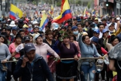 Indigenous anti-government demonstrators chant slogans against President Lenin Moreno and his economic policies during a nationwide strike, in Quito, Ecuador, Oct. 9, 2019.
