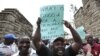 Teachers demonstrate outside Kenya's Parliament Buildings in the capital Nairobi, September 7, 2011. 