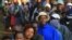 People reported standing in line for several hours before casting their vote in Kenya’s general elections in Gatundu, Kenya, March 4, 2013.” (J. Craigs/VOA)
