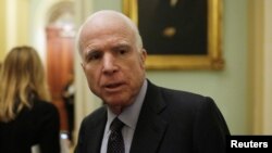 Senator John McCain (R-AZ) speaks to reporters after the Senate voted to remove the filibuster rule for Supreme Court nominees, on Capitol Hill in Washington, April 6, 2017.