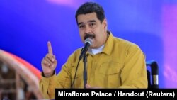 Venezuela's President Nicolas Maduro speaks during a meeting in a hospital for budget approval for its reconstruction in La Guaira, Venezuela, April 6, 2018.