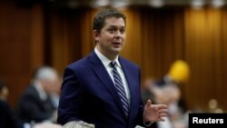 FILE - Canada's Conservative Party leader Andrew Scheer speaks during Question Period in the House of Commons on Parliament Hill in Ottawa, Ontario, Canada, Dec. 12, 2019.