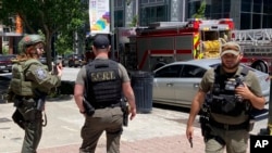 Des agents de police près de la scène d'une fusillade le mercredi 3 mai 2023 à Atlanta, dans l'État de Géorgie.