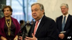 United Nations Secretary-General Antonio Guterres talks with members of the U.N. staff at U.N. headquarters, Jan. 3, 2017. 