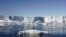 An Adelie penguin stands atop a block of melting ice near the French station at Dumont d’Urville in East Antarctica Jan. 23, 2010.