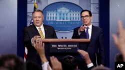 U.S. Secretary of State Mike Pompeo and Treasury Secretary Steve Mnuchin take questions during a briefing on terrorism financing at the White House, Sept. 10, 2019, in Washington. 