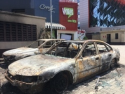FILE - A middle-class shopping area was looted Oct. 22, 2020, after the army repressed protesters gathered at the Lekki toll gate despite curfew.