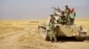 Peshmerga Struggle to Seize Last IS-held Town in Iraqi Kurdistan