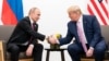 资料照片：美国总统特朗普2019年6月28日在日本大阪举行的二十国集团(G20)峰会上与俄罗斯总统普京举行双边会谈。