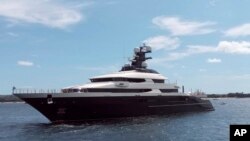 A luxury yacht named Equanimity is seen in the Benoa harbor in Bali, Indonesia, Feb. 28, 2018. 