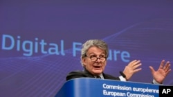 FILE - European Commissioner for Internal Market Thierry Breton speaks during a presentation on Europe's Digital Future at EU headquarters in Brussels, Belgium, Feb. 19, 2020.