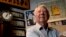 FILE - Mort Walker, the artist and author of the 'Beetle Bailey' comic strip, stands in his studio in Stamford, Conn. On, Jan. 27, 2018, a family member said Walker had died at age 94.