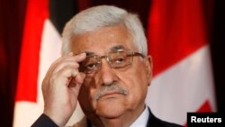 Mahmoud Abbas, que assumiez el poder en Palestina en 2005, fue reelegido al frente de la OLP.