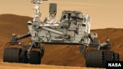 Umetnički prikaz rovera Kjuriositi na površini Marsa