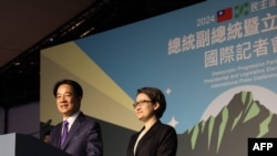 台湾当选总统赖清德与竞选搭档萧美琴胜选后在台北的竞选总部外举行国际记者会。(2024年1月13日)