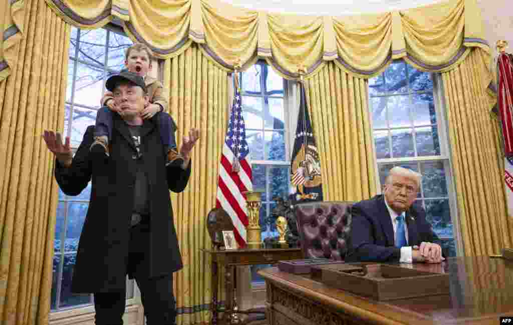 Tesla and SpaceX CEO Elon Musk with his son X Æ A-Xii join U.S. President Donald Trump in the Oval Office of the White House in Washington, Feb. 11, 2025. 