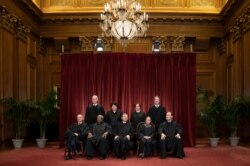 FILE - Justices of the U.S. Supreme Court gather for a group portrait, Nov. 30, 2018.