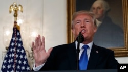 FILE - President Donald Trump makes a statement on Iran policy in the Diplomatic Reception Room of the White House, in Washington, Oct. 13, 2017.