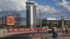 People walk past the Toussaint Louverture International Airport on the day it reopened in Port-au-Prince, Haiti, Dec. 11, 2024.