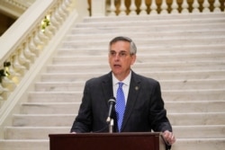 Georgia Secretary of State Brad Raffensperger speaks during a news conference on Friday, Nov. 20, 2020, in Atlanta. Georgia’s top elections official said he will certify that Joe Biden won the state's presidential election after a hand tally…