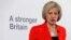 FILE - Britain's Home Secretary Theresa May speaks at a news conference in London, March 23, 2015.