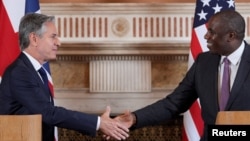 U.S. Secretary of State Antony Blinken and Britain's Foreign Secretary David Lammy shake hands at the end of their joint press conference in the Locarno room at the Foreign, Commonwealth and Development Office in London, Britain, Sept. 10, 2024.