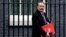 Britain's Secretary of State for International Trade Liam Fox leaves a Cabinet meeting at Downing Street in London, Jan. 15, 2019.