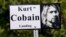 Sebuah poster menandai lokasi “Kurt Cobain Landing,” sebuah taman kecil dekat rumah masa kecil mendiang Kurt Cobain, mantan vokalis utama Nirvana, di Aberdeen, Washington.
