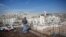 Laborer stands on apartment building construction site in Jewish settlement known to Israelis as Har Homa and to Palestinians as Jabal Abu Ghneim, West Bank, Oct. 28, 2014.