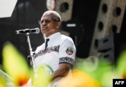 FILE — Inkatha Freedom Party (IFP) leader Velenkosini Hlabisa addresses supporters during the IFP election manifesto launch at the Moses Mabhida Stadium in Durban on March 10, 2024.